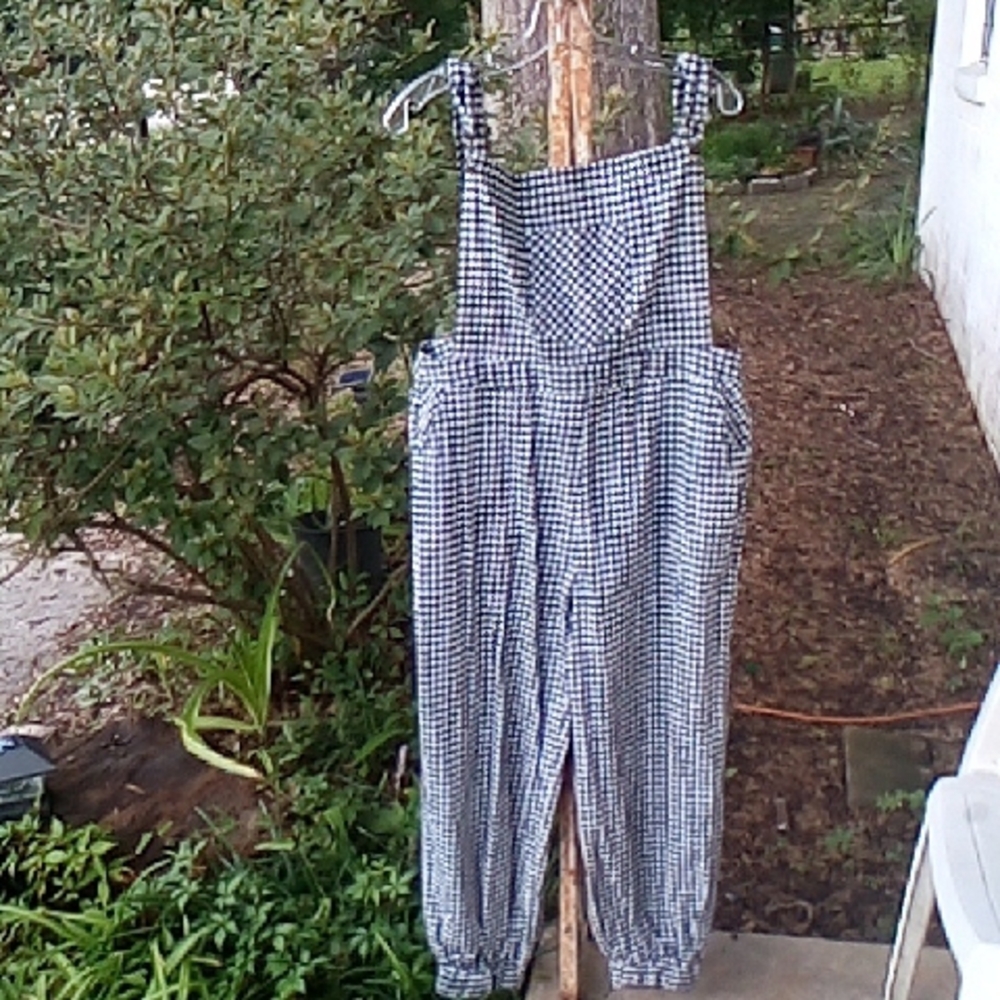 Fashion Nova Black and White Houndstooth Jumpsuit Buy Now